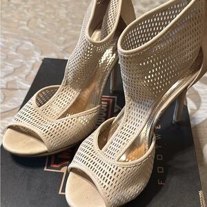 JLO heels. Only use a few times. Still look brand new. Asking for $30.Size 7.5.